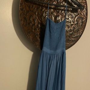 Dusty blue, backless flowy maxi dress. Never worn.